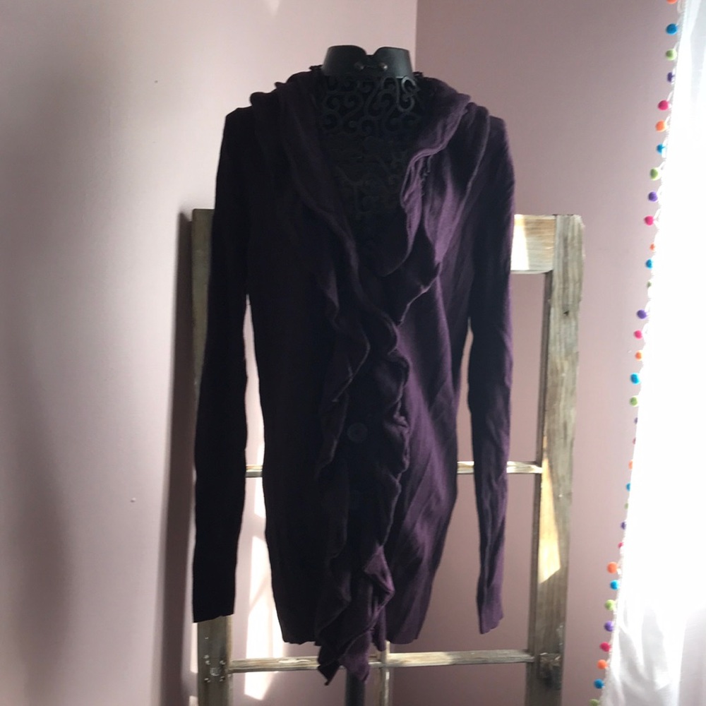 Purple button up Ladies sweater no tag but I would say medium/large